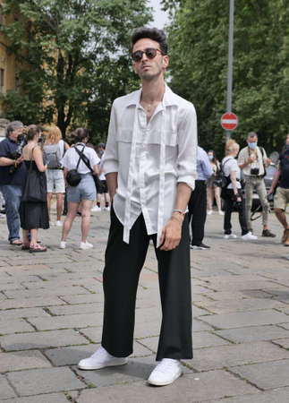 Fashion blogger posing for photographers after Etro fashion show during MFW201 woman collections!のeditorial素材