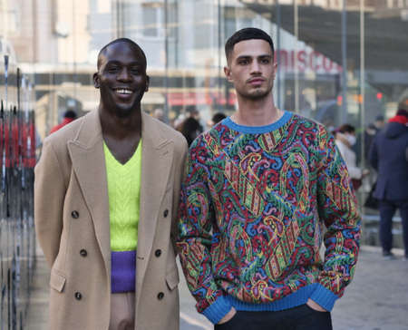 Two fashion bloggers street style outfit during Etro Fashion Show at Milan Fashion Week Fall / Winter 2021/2022 collections.のeditorial素材