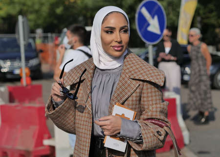 Milan, Italy: Fashion blogger after Tods fashion show during Milano fashion week fall / winter collections 2021/2022のeditorial素材