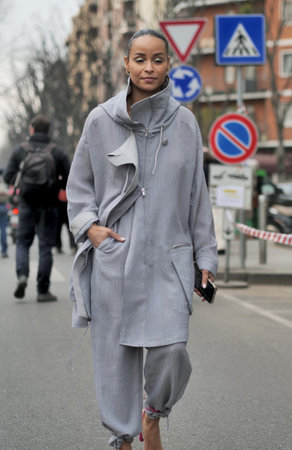 Milan, Italy February 2022: Fashion blogger street style outfit before Armani fashion show during Milano Fashion week 2022のeditorial素材