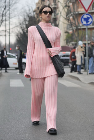 Milan, Italy February 2022: Fashion blogger street style outfit before Armani fashion show during Milano Fashion week 2022のeditorial素材