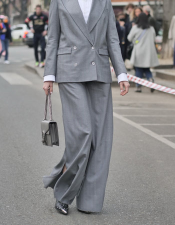 Milan, Italy February 2022: Fashion blogger street style outfit before Armani fashion show during Milano Fashion week 2022のeditorial素材