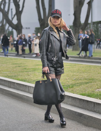 MILAN, Italy: February 2022: Fashion blogger street style outfit before Armani fashion show during Milan fashion week Fall/winter 2022のeditorial素材