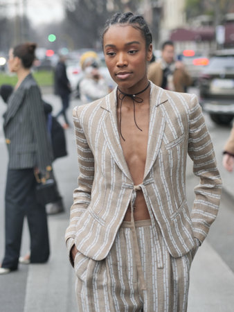 Milan, Italy February 2022: Fashion blogger street style outfit before Armani fashion show during Milano Fashion week 2022のeditorial素材