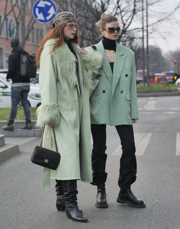 Milan, Italy February 2022: Fashion blogger street style outfit before Armani fashion show during Milano Fashion week 2022のeditorial素材