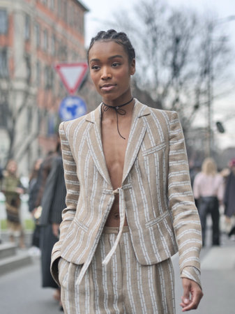 Milan, Italy February 2022: Fashion blogger street style outfit before Armani fashion show during Milano Fashion week 2022のeditorial素材