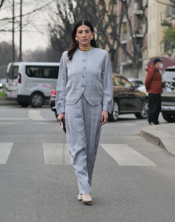 MILAN, Italy: February 2022: Fashion blogger street style outfit before Armani fashion show during Milan fashion week Fall/winter 2022のeditorial素材