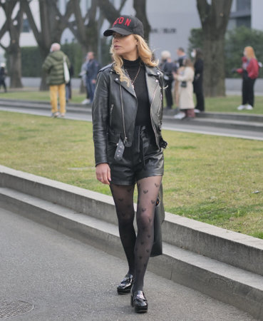 Milan, Italy February 2022: Fashion blogger street style outfit before Armani fashion show during Milano Fashion week 2022のeditorial素材