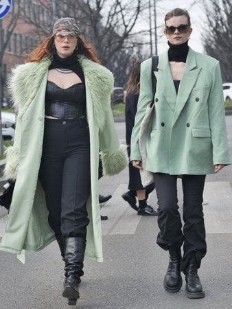 Milan, Italy February 2022: Fashion blogger street style outfit before Armani fashion show during Milano Fashion week 2022のeditorial素材