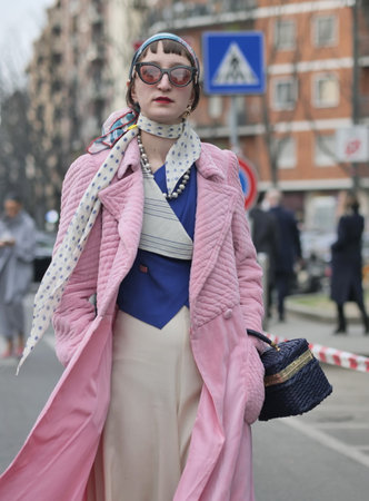 Milan, Italy February 2022: Fashion blogger street style outfit before Armani fashion show during Milano Fashion week 2022のeditorial素材