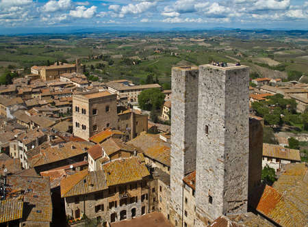 Twin towers in a medieval city  San Gimignano, Tuscany, Italy の写真素材
