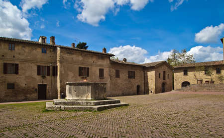 Medieval city square in San Gimignano, Tuscany, Italy, Europe の写真素材