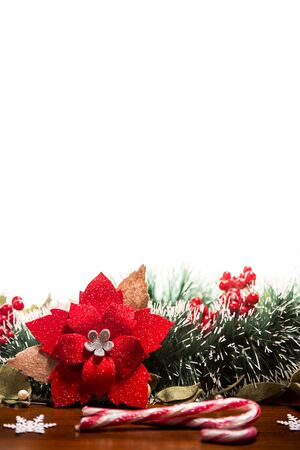 Holiday's background with Christmas decorations (Berries, Stars and Candy Canes)の写真素材