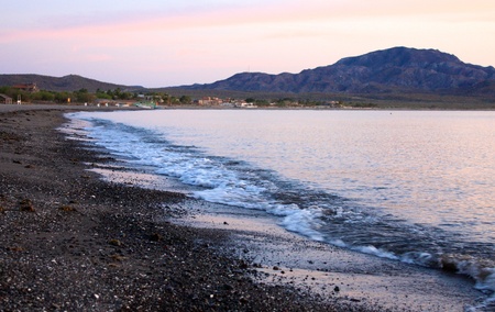 Beach in the morning near sunrise with waves.の写真素材