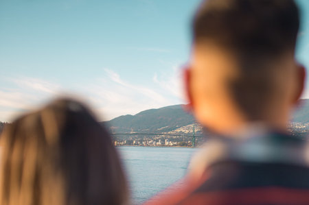 Young couple looking at Bosphorus Strait in Istanbul, Turkey.