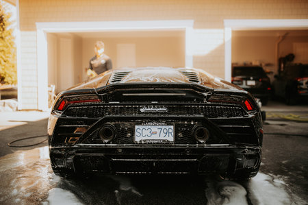 Black Porsche 911 Turbo S at the city street.のeditorial素材