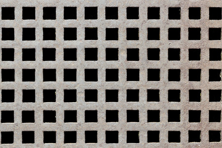 Grunge square pattern in a water rain grillの写真素材