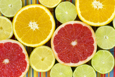 Colorful citrus grapefruit, orange, lemon and limeの写真素材