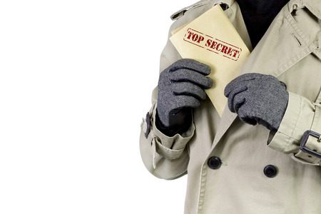 Spy showing top secret documentsの写真素材