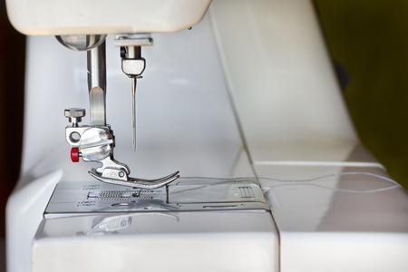 Closeup image of the needle of a sewing machineの写真素材