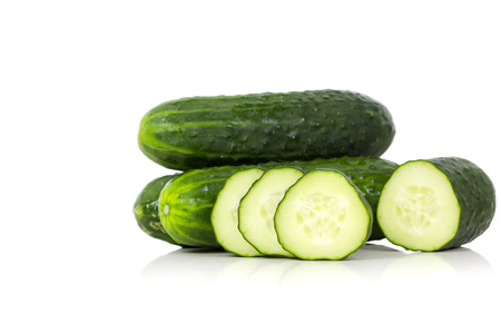 Cucumber, spanish type, over a white background.の写真素材