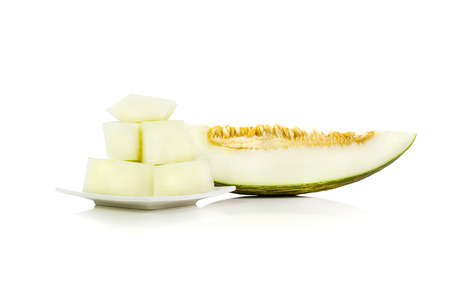 Isolated melon pieces, over a white backgroundの写真素材