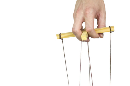 Manage the threads of a puppetの写真素材