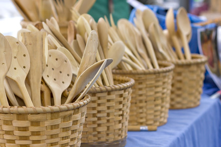 Wooden cooking utensils in wooden baskets.の写真素材