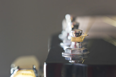 Closeup image of the last tuner post.の写真素材