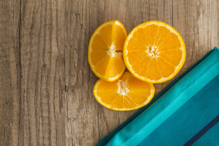 Oranges with blue napkin