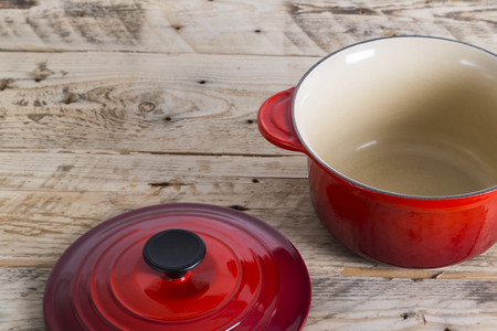 Red saucepan with lid offの写真素材