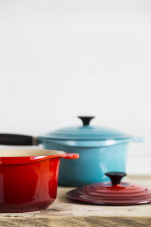 Open red and blue saucepansの写真素材