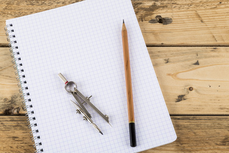 Pencil, dividers and notepad