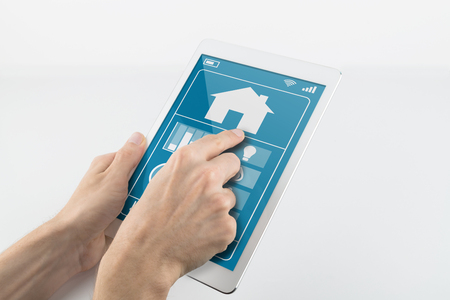 Tablet controlling internet of things devicesの写真素材