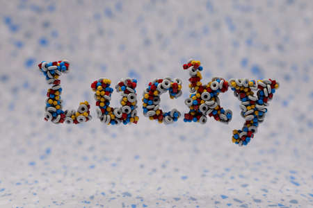 beautiful multi-colored inscription lucky consisting of patterns of small spheres, cubesの写真素材