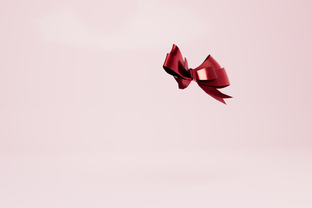 red gift bow on a pastel background. copy paste, copy space. 3d rendering.の写真素材