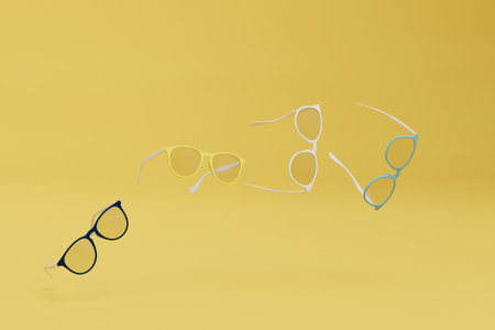 trendy sunglasses. sunglasses flying over a yellow background. 3d rendering.の写真素材