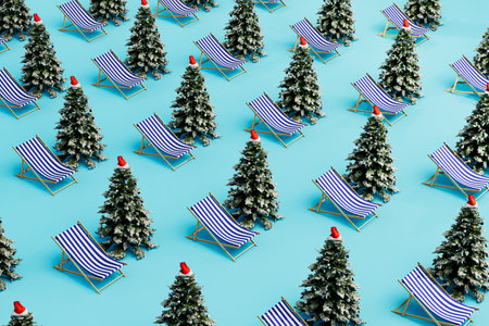 the concept of choosing a holiday. patterns of Christmas trees and beach sunbeds. 3D rendering.の写真素材