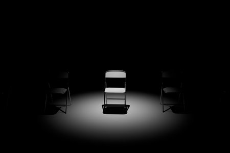 psychological assistance. chairs with a dark room one of which is illuminated by the beam of a spotlight. 3D rendering.の写真素材