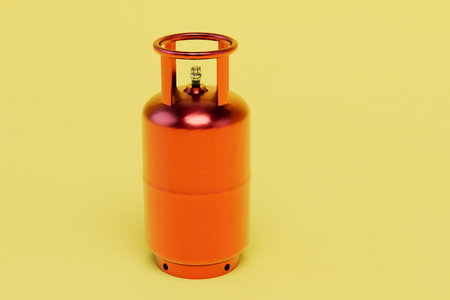 a large orange gas cylinder on a yellow background. 3D rendering.