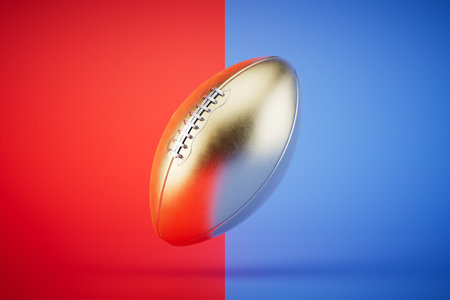 Rugby championship. a golden ball for rugby on a red and blue background. 3D rendering.の写真素材