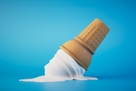 fallen melted ice cream in a waffle cup on a blue background. 3D rendering.の写真素材