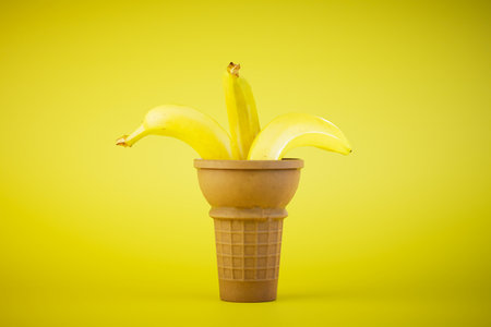 waffle cup with bananas on a yellow background. 3D rendering.の写真素材