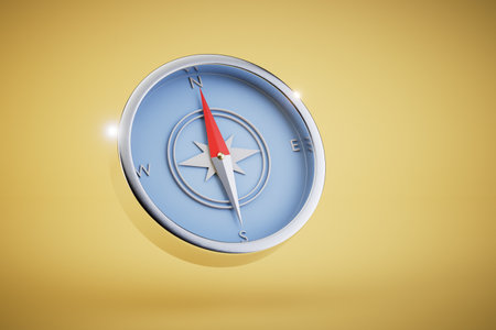 Determine the route by compass. compass on a yellow background. 3D rendering.の写真素材