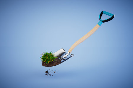 the concept of cultivating land in the garden. shovel with earth and grass on a blue background. 3D rendering.の写真素材