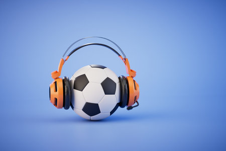 football match commentator. A soccer ball with headphones on a blue background. 3D rendering.の写真素材