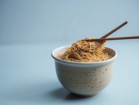 Ramen noodle lifted up by chopsticks. ai generative.の素材