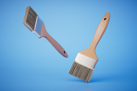 paintbrushes on blue background. 3d rendering.の写真素材