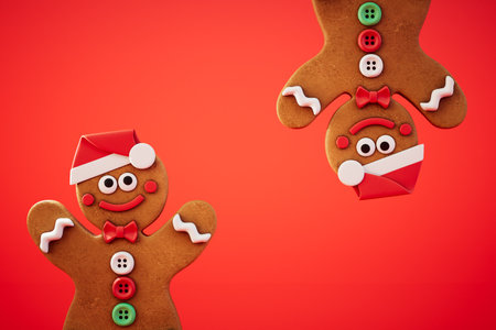 concept of christmas celebration. christmas cookies mans on red background. 3d rendering.