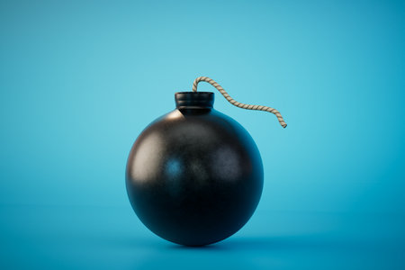 An old round black bomb on a blue background. 3D rendering.の写真素材